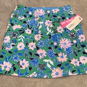 Luxletic Lilly Pulitzer Women's Floral Mini Skort - Green, Pink, and Blue.